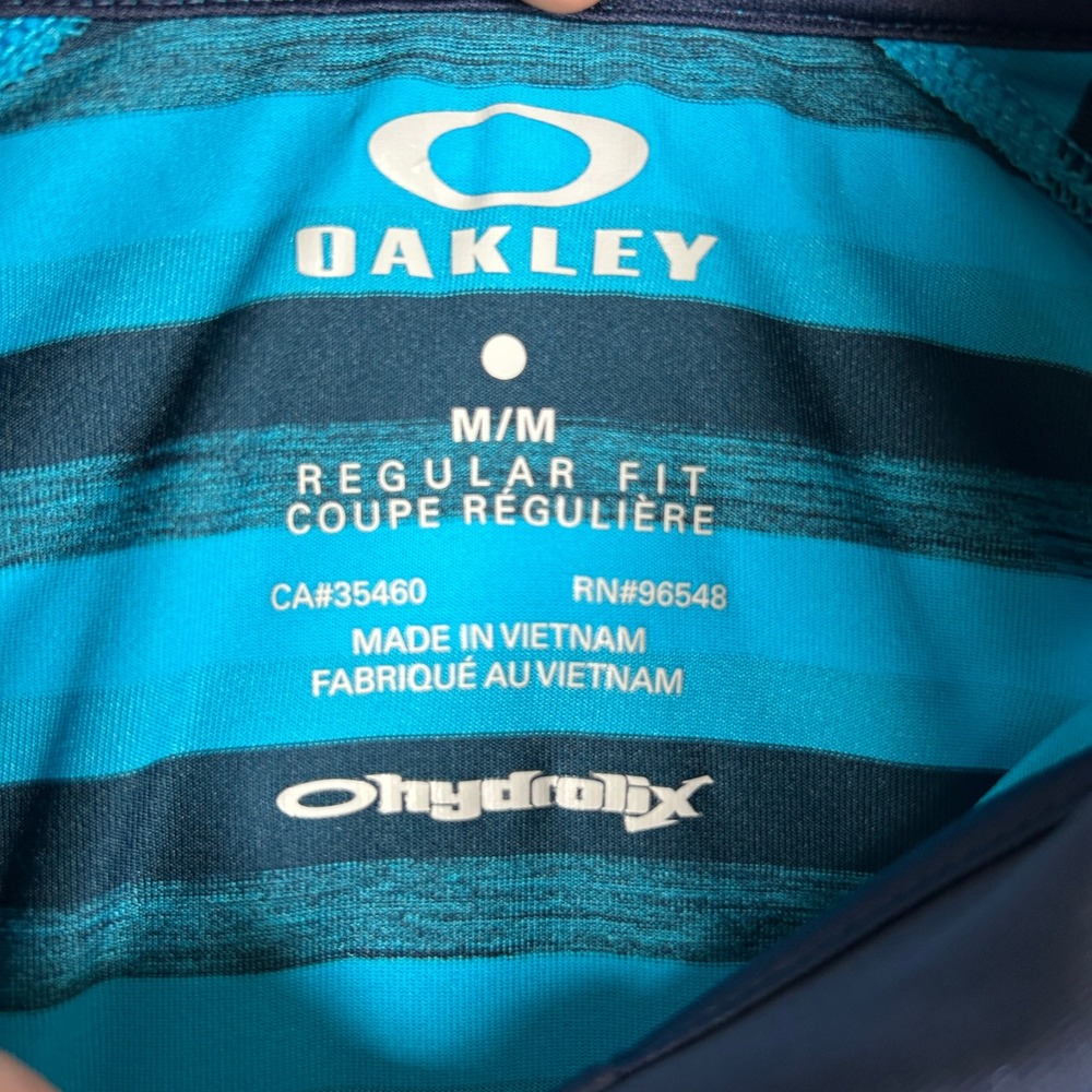 Oakley Hydroix Polo Shirt Men's Regular Fit Blue Black Stripe Pocket Golf Active - Picture 2 of 6